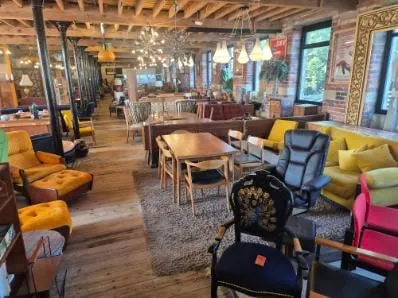 Mid-century armchairs, teak dining sets and sofas across the Scandex floor at Cullingworth
