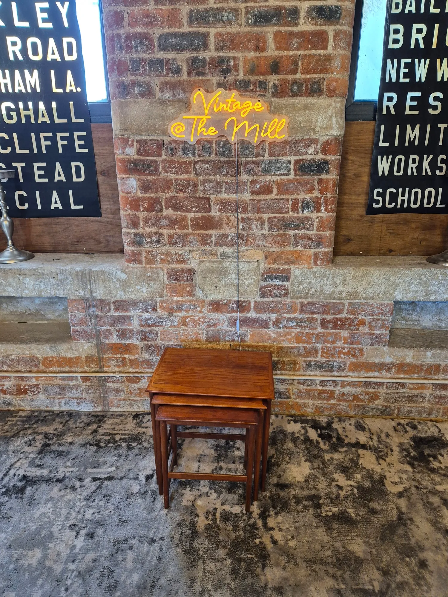 Mid-century teak nest of three graduated occasional tables at Scandex, Cullingworth.
