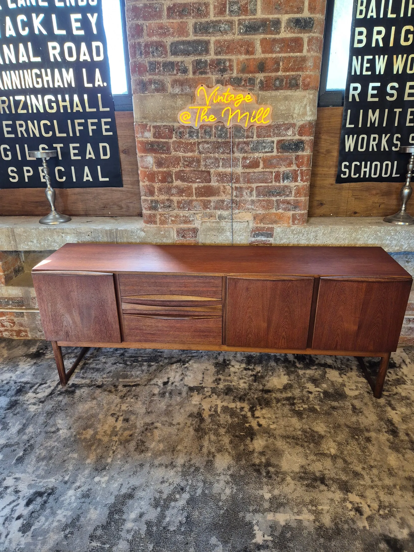 A restored teak sideboard on the Scandex floor at Cullingworth Mills
